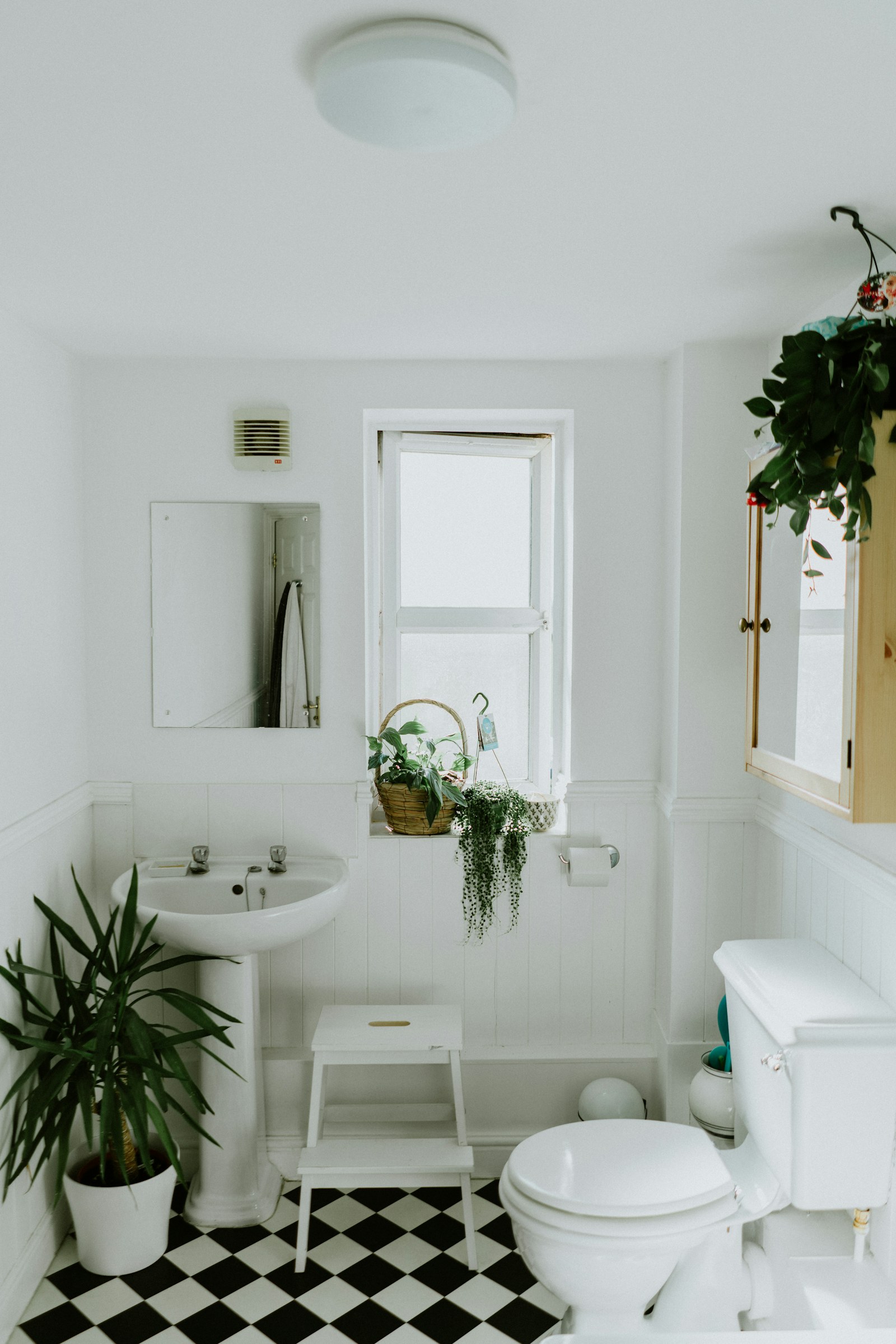Clean bathroom with soft light on tile and fixtures