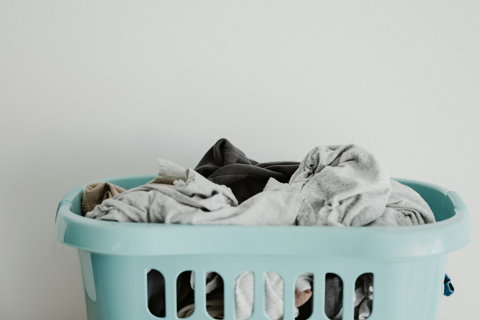 Folded laundry and textiles in a calm domestic space